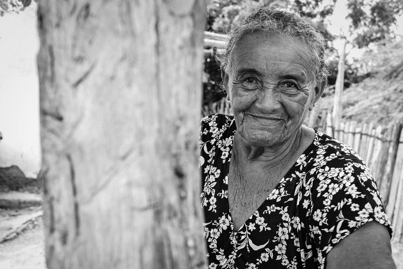 a black and white photo of an older woman
